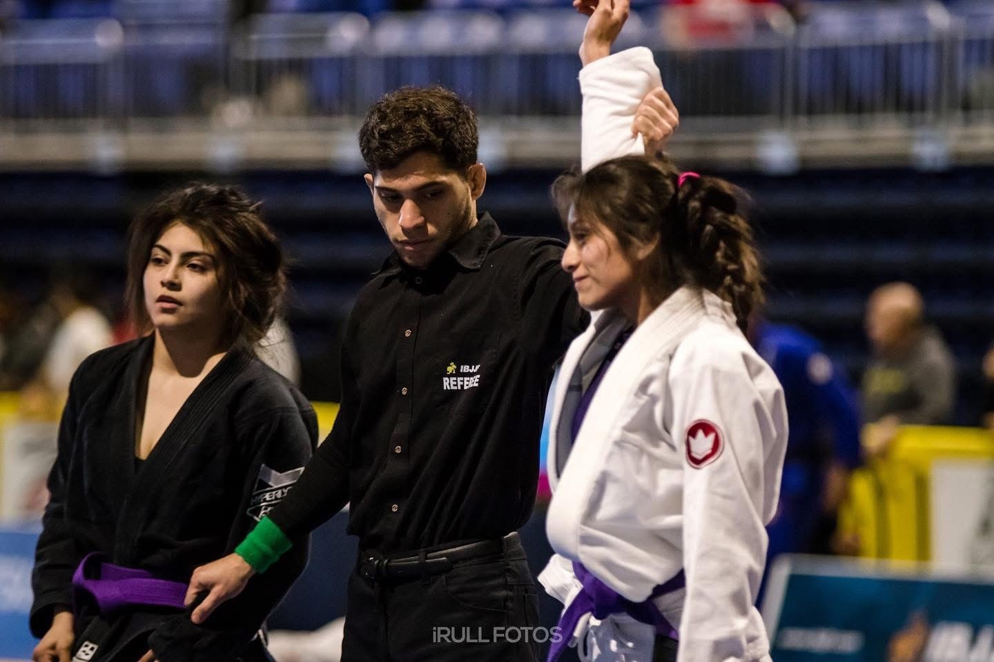 Martial arts students and coaches gathered as a team