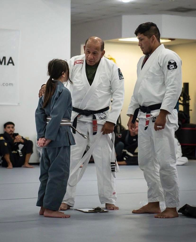 Youth martial arts class practicing together